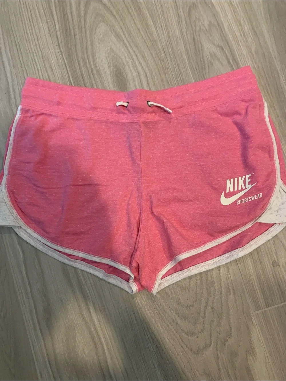 Nike Women's Coral Pink Athletic Shorts with White Trim
